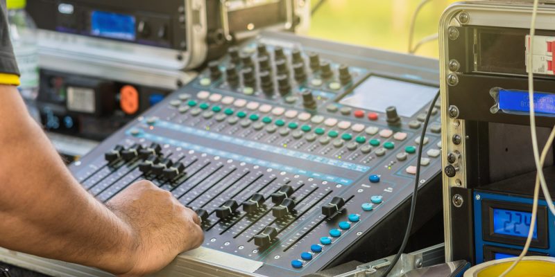 Closeup hand prepare adjust the audio mixer, Musical concept